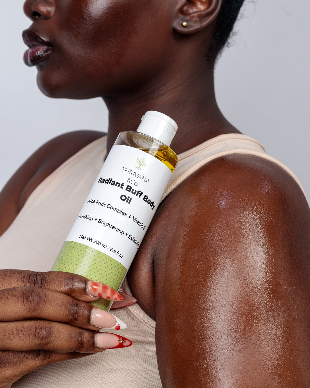 THRIVANA & CO RADIANT  BUFF BPDY OIL 200ml/ 6.8 fl oz

AHA Fruit Complex + Vitamin E

Smoothing • Brightening • Exfoliating