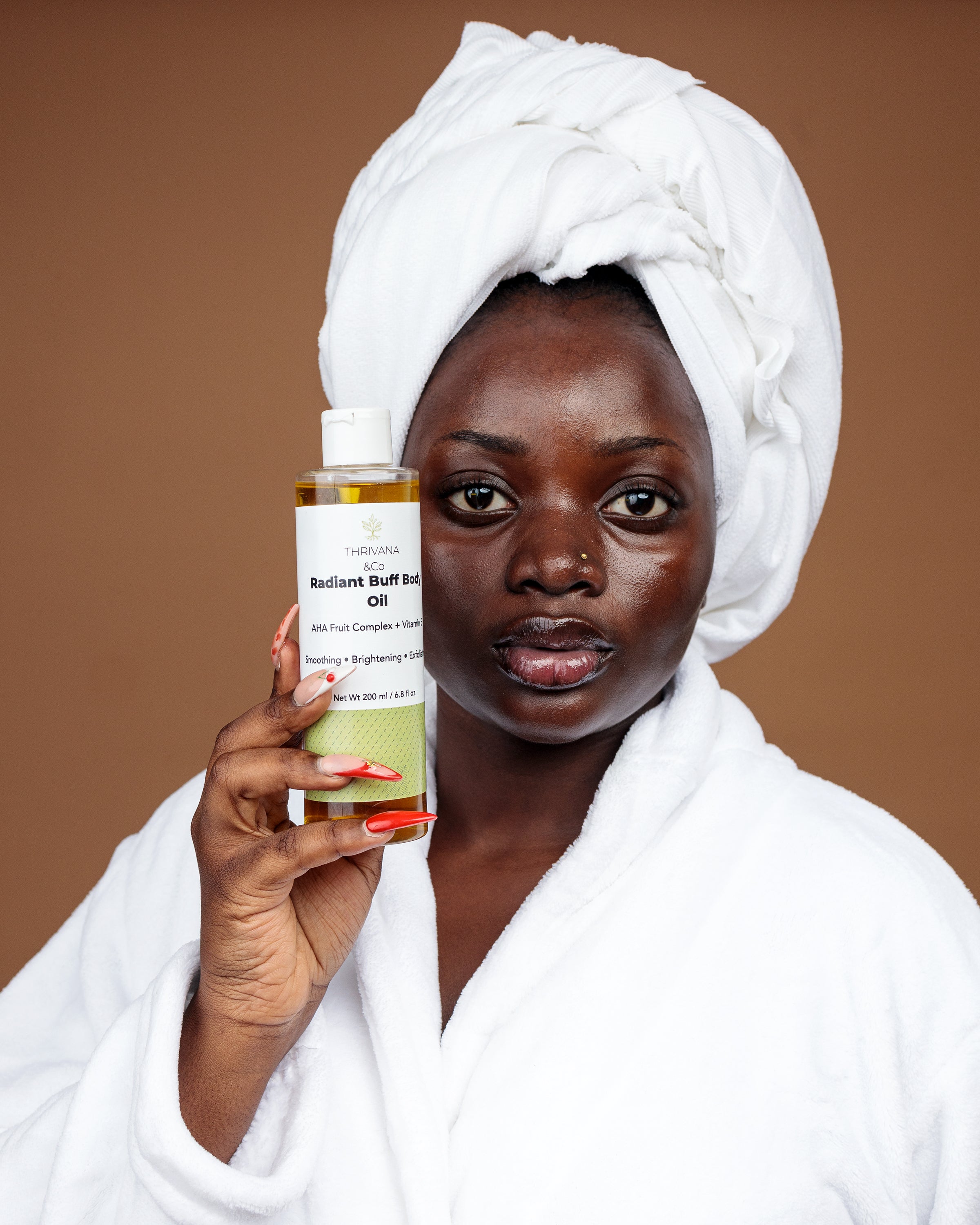 THRIVANA & CO RADIANT  BUFF BPDY OIL 200ml/ 6.8 fl oz

AHA Fruit Complex + Vitamin E

Smoothing • Brightening • Exfoliating