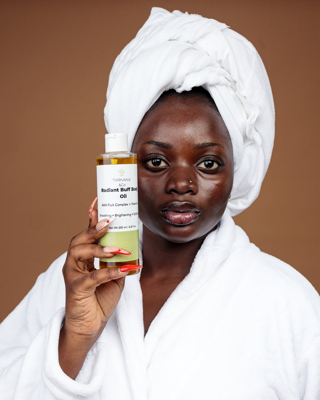THRIVANA & CO RADIANT  BUFF BPDY OIL 200ml/ 6.8 fl oz

AHA Fruit Complex + Vitamin E

Smoothing • Brightening • Exfoliating